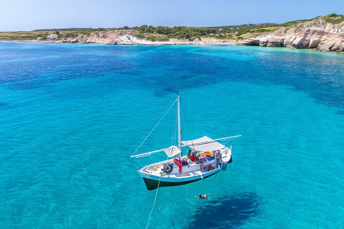 Guided day by boat in Carloforte with snorkelling and aperitif - Cala Mezzaluna: the snorkelling and swim highlight