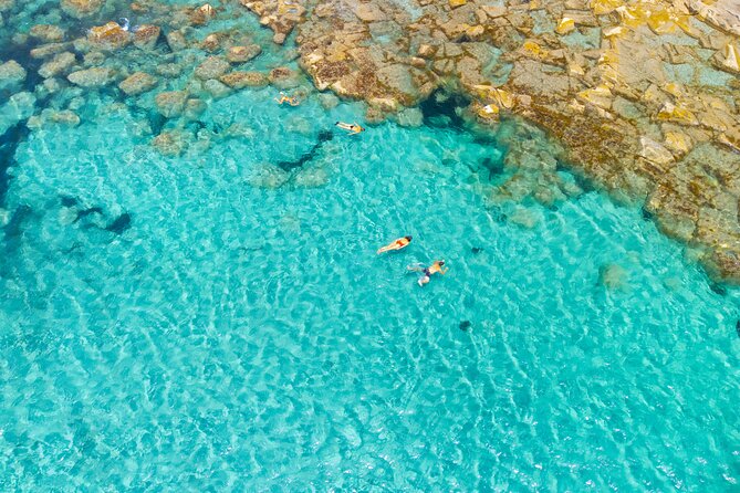 Guided day by boat in Carloforte with snorkelling and aperitif - Spiaggia La Bobba: the last swim break with calm, sandy water
