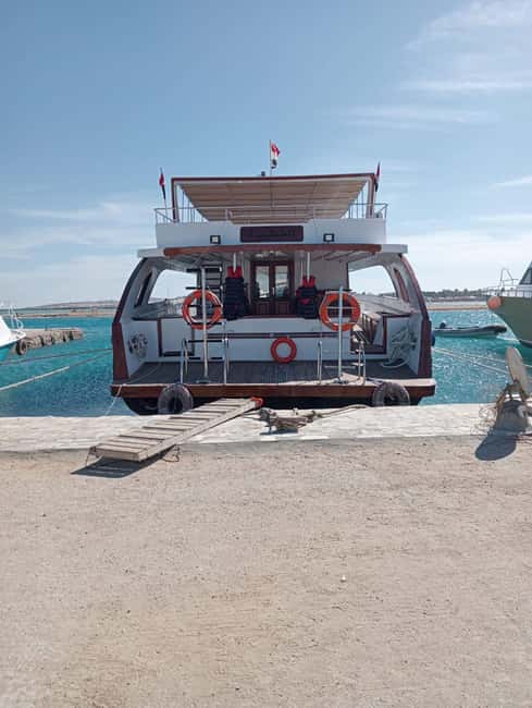 Hurghada: Dolphin & Coral Reef Snorkeling Tour with Lunch - Banana boat or sofa boat: the fun add-on moment