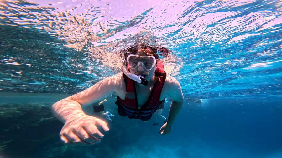 Hurghada: Dolphin Watching Boat Tour with Snorkeling & Lunch - Two Snorkeling Stops Over Coral Reefs (Plus Guidance That Helps)