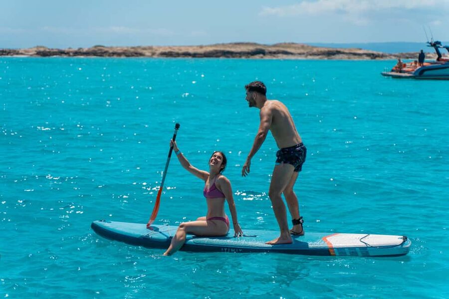 Ibiza: Formentera Trip with Paddle, Snorkel and Lunch - The onboard vibe: drinks, music, and the boat’s sometimes-rocky feel