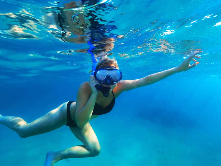 Ibiza: Snorkeling and SUP Paddle, Beach and Cave Tour - Cala Conta stop: shallower water, sandy vibes, and relaxed second chances