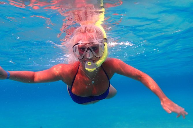 Ibiza Snorkeling Beach and Cave Tour - The boat ride, music, and crew vibe: how it feels onboard