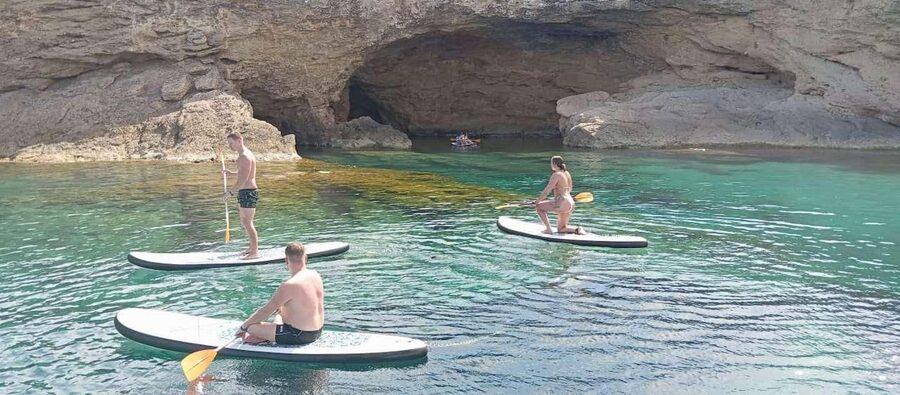 Ibiza: Snorkeling, Sunset Beach and Cave Boat Trip - The sunset sail payoff: Champagne and open-bar comfort
