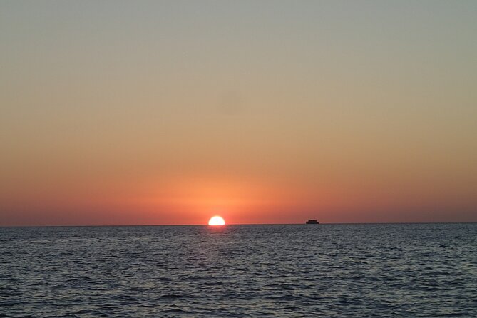 Ibiza Sunset Snorkeling Beach and Cave Tour - Cala Conta area: your third swim window and the view payoff