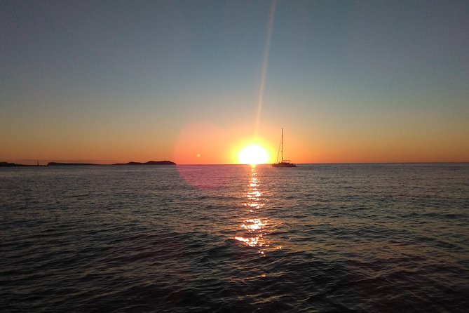 Ibiza Sunset Snorkeling Beach and Cave Tour - San Antonio Bay opening stop: cave potential plus first water time