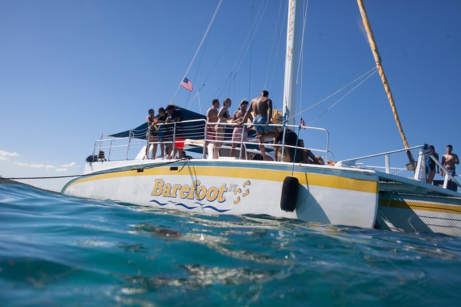 Icacos Deserted Island Catamaran, Snorkel, and Picnic Cruise - Cayo Icacos island time: shells, swimming, and beach toys