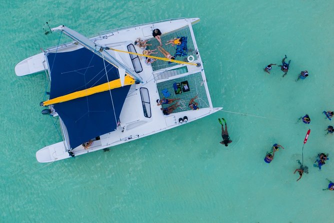 Icacos Deserted Island Catamaran, Snorkel, and Picnic Cruise - Drinks, music, and the vibe onboard Barefoot IV