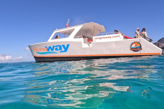 Icacos Double Dip Power Catamaran Snorkel & Beach Tour - The Double Dip rhythm: rum bar and deli lunch that hits after the swim