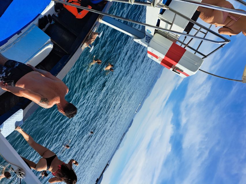 Ischia: Island Boat Tour with Neapolitan Lunch & Snorkeling - Offshore sightlines: Capri, Sorrento, Vesuvius, Procida