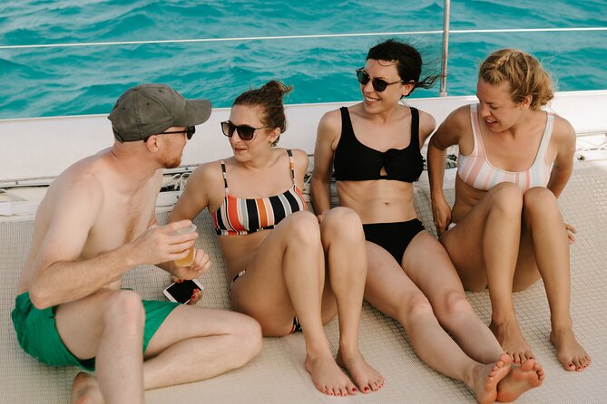 Isla Mujeres Catamaran Tour with Open Bar, Lunch and Snorkeling - Isla Mujeres Town Time: Souvenirs, Walking, and Getting Around