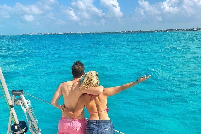 Isla Mujeres Catamaran Tour with Snorkel, Open bar and Transport - The open bar + music: fun factor with a built-in reality check