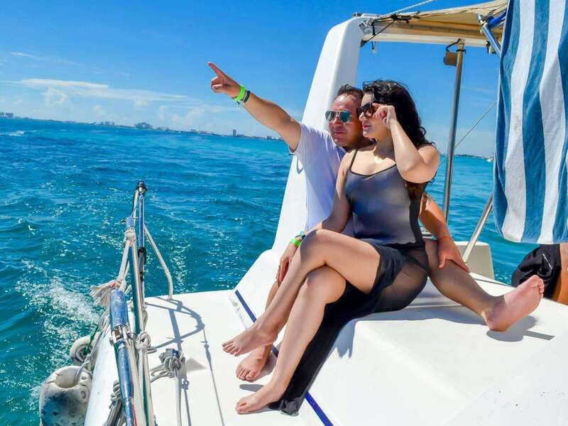 Isla Mujeres: Catamaran with Open Bar, Snorkeling and Lunch - Free time on Isla Mujeres: walk, shop, or go island-style with a golf cart