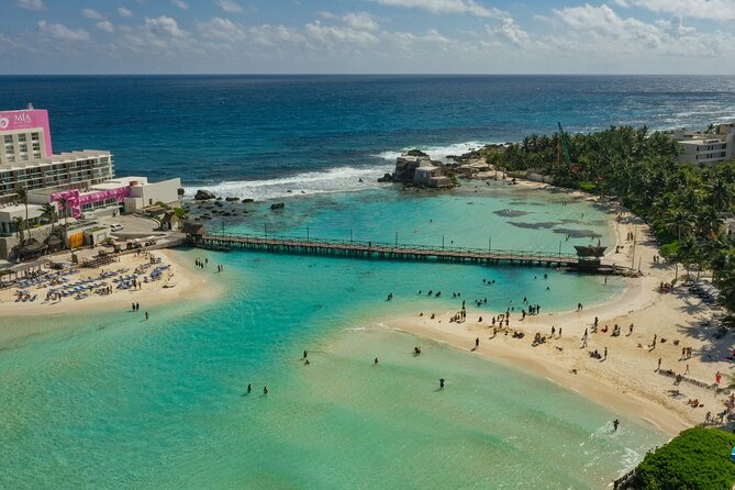 Isla Mujeres Island and Snorkeling Tour - Isla Mujeres downtown: Malecón strolls, Magic Town status, and ice cream