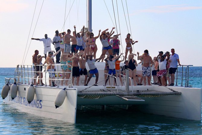 Jamaica Dunn's River Falls Party Cruise with Snorkeling - The boat ride itself: sights from the water and a built-in vibe
