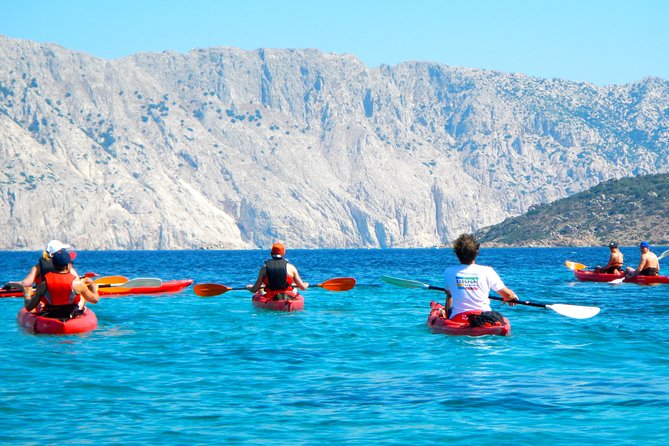 Kayak Tour with Snorkeling and Local Aperitif - Capo Coda Cavallo beach stop and the local fruit aperitif