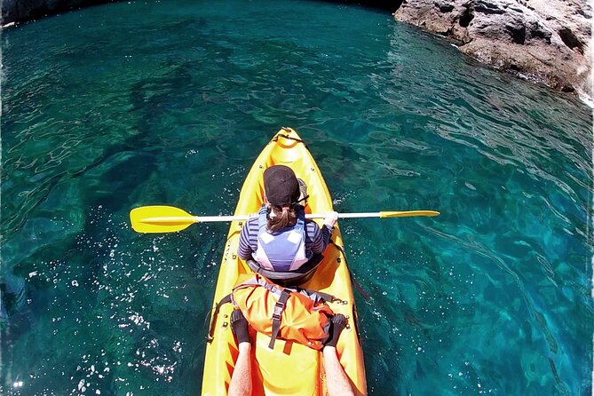 Kayaking Adventure Route with Snorkeling in Mogan Caves - Cave Swimming and Cliff-Jumping Options: The Adrenaline Moment