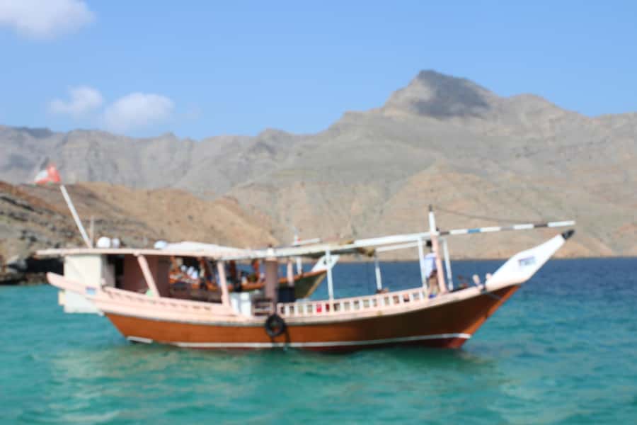 Khasab: Half-Day Dhow Cruise, Dolphin Watching, & Snorkeling - Musandam fjords by traditional dhow: the 3-hour feel