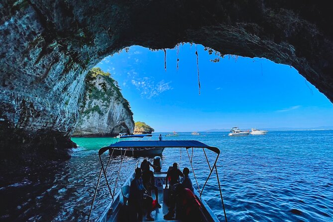 Los Arcos 5 islands Snorkeling Cliff Jumping and Hidden Beach - Food and drinks onboard: included beer, water, and the snack situation