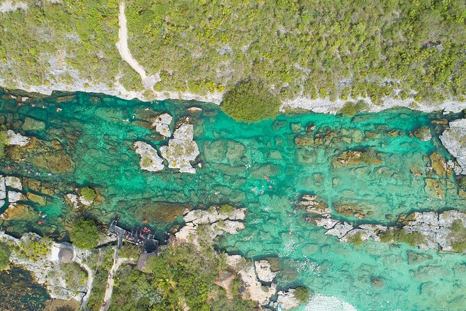 Magical Cenote and Paradise Lagoon Snorkeling Adventure - Snorkel gear, life jackets, and how different guides run the day