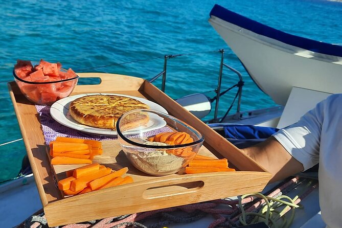 Mallorca Sailing Adventure with Snorkeling, Snacks & Drinks - Snorkeling gear and Paddleboard Surf: how the included stuff changes your packing