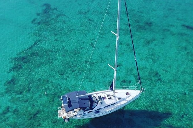Mallorca sailing, snorkelling, as a Local with drinks and food - Onboard Lunch and Drinks: Pizza-Style Food and What Is Included