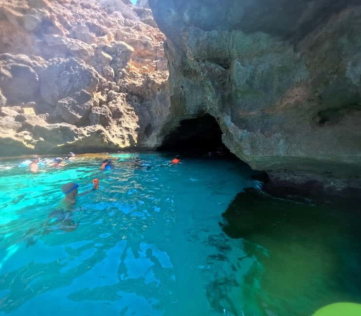 Mallorca: Sea Caves Kayaking Tour, Snorkeling & Snack - Getting Fitted: Water Shoes, Life Jacket, Mask, and Weather Gear