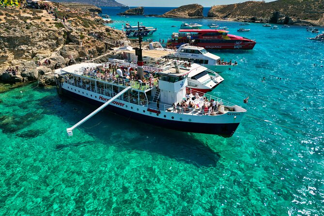 Malta: Comino, Blue Lagoon & Caves - swim, snorkel & slide - Blue Lagoon Time: The Boat as Your Base (Not the Crowds)