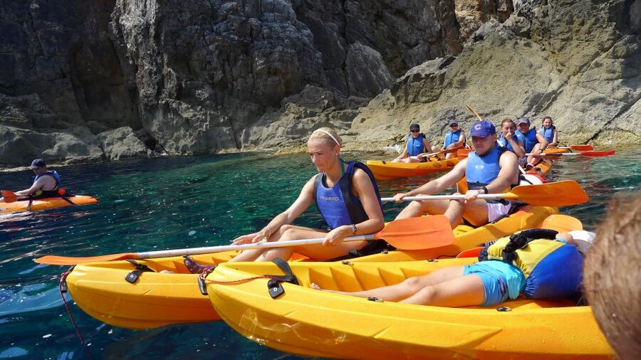 Menorca: Kayak and Marine Reserve Snorkeling Adventure - Kayaking La Mola de Fornells: cliff scenery with a real sense of space