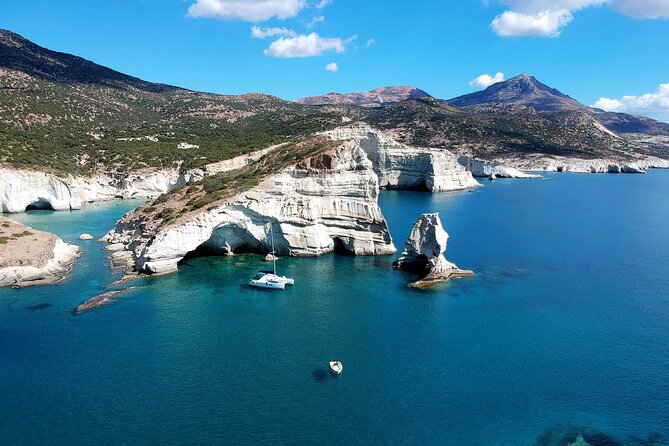 Milos caves snorkelling Catamaran Cruise in a small group - Kalogries Beach swim stop: light breakfast and a short burst of water time