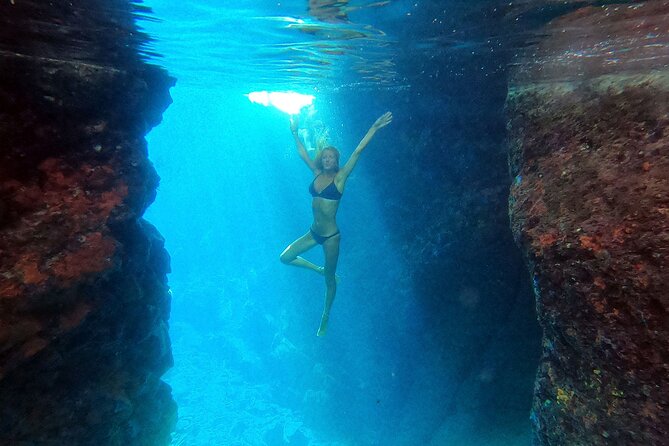 Milos caves snorkelling Catamaran Cruise in a small group - Agios Dimitrios: a calmer final swim and the best “look back” views