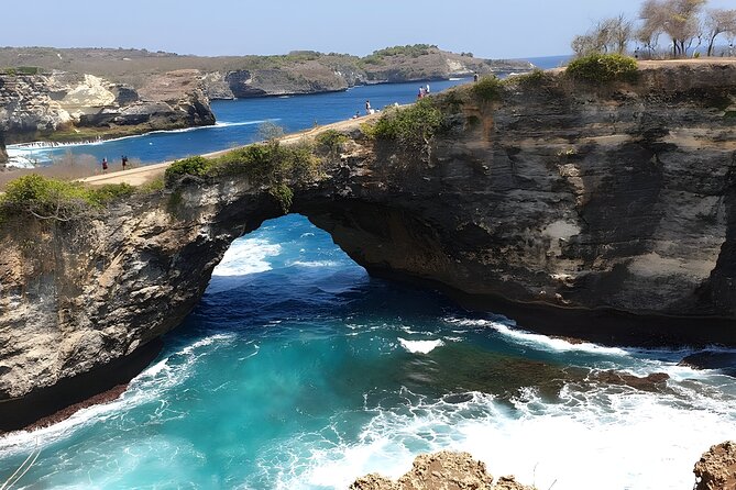 Nusa Penida Island Beach Tours with Snorkeling From Bali - Gamat Bay and Crystal Bay: clean sand, coral color, and calmer vibes