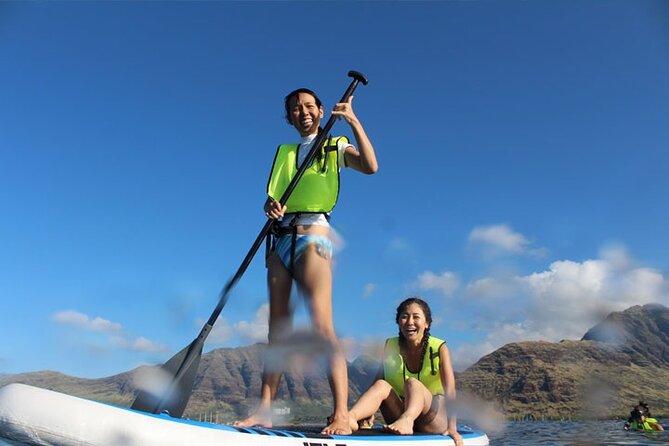 Oahu Dolphin and Snorkel Tour with Waikiki Pickup & Lunch - Hula, music, and onboard culture moments