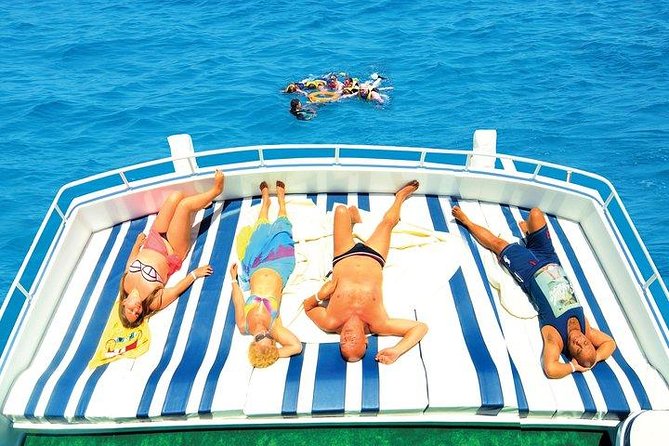 Orange Bay Snorkeling Sea Trip & Water Sports Banana boat & Quadra -Hurghada - Orange Bay Island Time: Photos, Beach Break, and Real Island Access