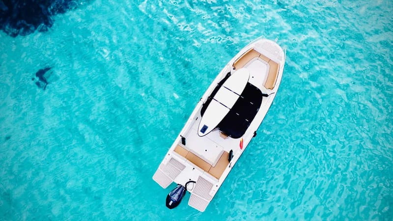 Palma de Mallorca: Private Boat Tour with Snorkel and Paddle - The Bay of Palma Coves: Where the Water Turns Bright