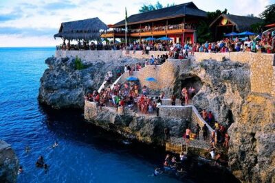 Party Catamaran: OpenBar, Music, Negril Beach, Caves, Snorkeling - Margaritaville Negril and 7 Mile Beach: Your Landing Pad