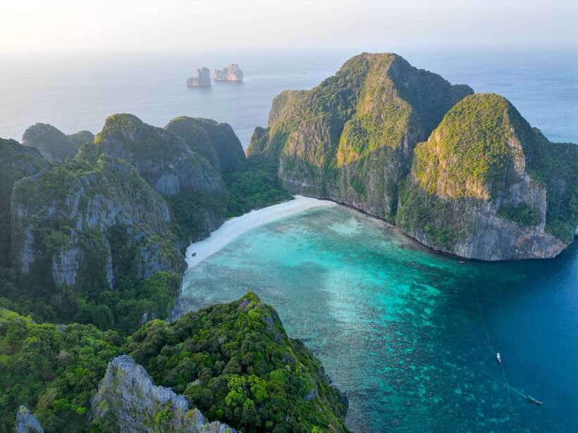 Phi Phi: Half-Day Speedboat Tour with Maya Bay & Snorkel - Pileh Lagoon swim: the perfect reset between island stops