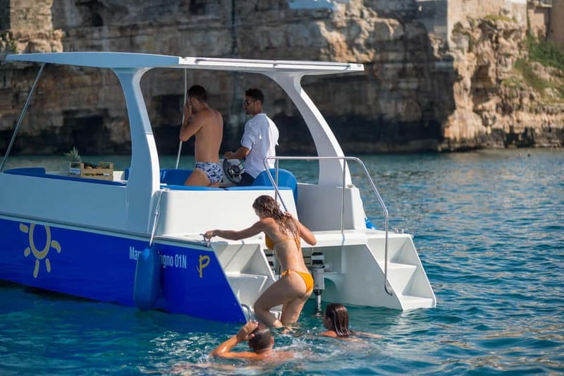 Polignano a Mare: Eco Boat Tour with Snorkeling and Caves - Eco catamaran sailing in Polignano: what Mar y Sol really changes