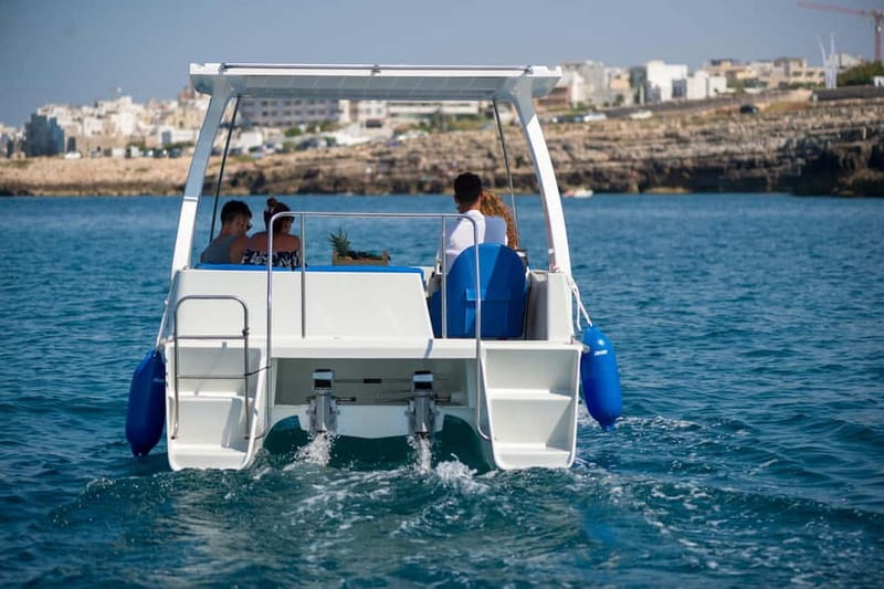Polignano a Mare: Eco Boat Tour with Snorkeling and Caves - Lama Monachile from the water: iconic beach, better angle