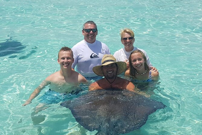Private Charter 34ft Express Cruiser Stingay City Reef Snorkeling - Food, Drinks, and Lunch on Your Terms
