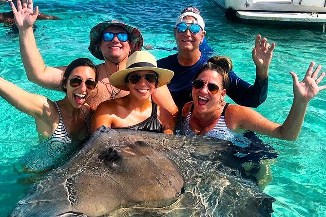 Private Charter 34ft Express Cruiser Stingay City Reef Snorkeling - Stingray City: The Shallow Sandbar That Actually Delivers
