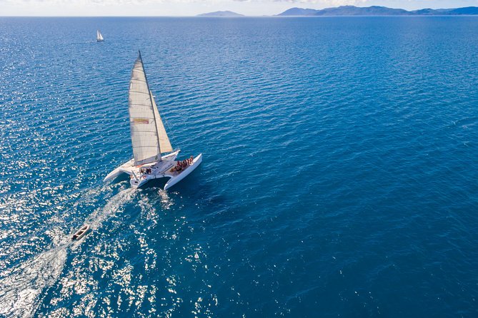 Providence Whitehaven Beach Sailing and Snorkeling Cruise - Lunch, coffee, and the food setup on a long day at sea