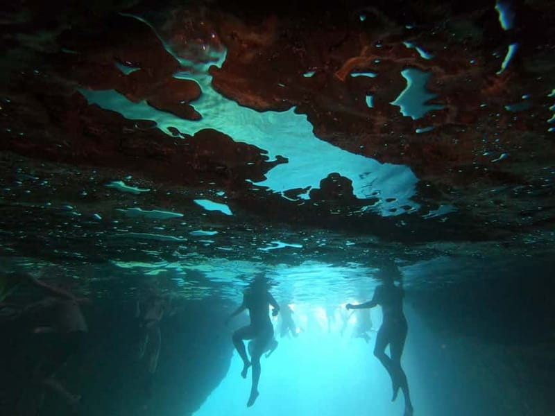 Pula: Cave Kayak, Snorkeling, Cliff Jumping All-in-one Tour - Snorkeling in the cave: turquoise water, sun rays, and a quick tide tip