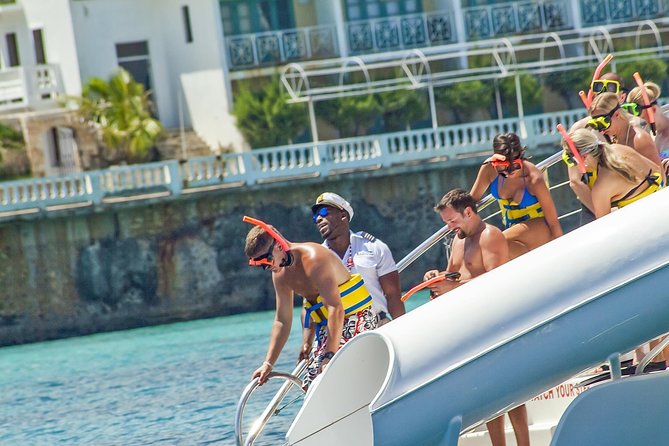 Reggae Catamaran and Snorkeling Open Bar Cruise Montego Bay - Unlimited open bar, DJ reggae, and Jamaican appetizers: what to expect onboard
