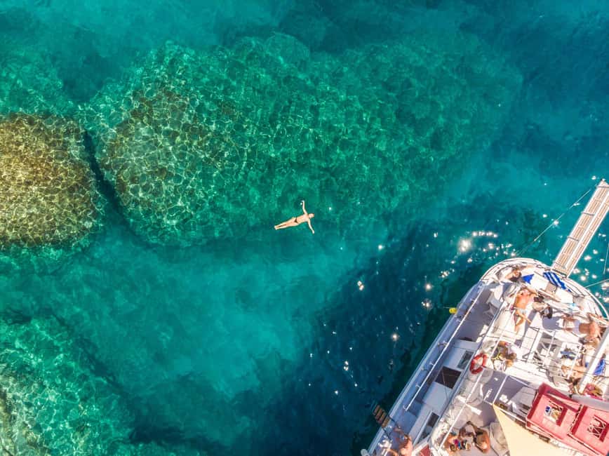 Rhodes: Boat Tour with Snorkeling, Gourmet Buffet & Open Bar - Afandou Beach and the Caves of Traganou: Lunch, Rocks, and Real Beach Time