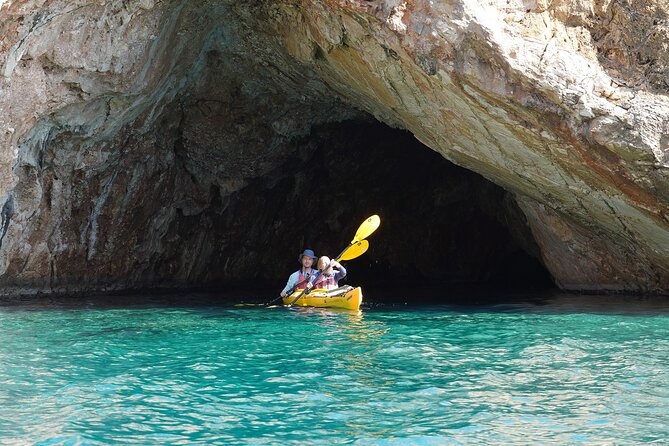 Rina Cave Sea Kayak Tour with Snorkeling and Picnic - The guide team: Manolis, Christina, and Noah’s teaching style