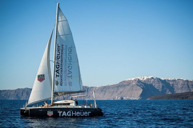 Santorini Adventurous Catamaran Experience with Snorkeling - Nea Kameni volcanic hot springs: snorkeling where the water runs warm