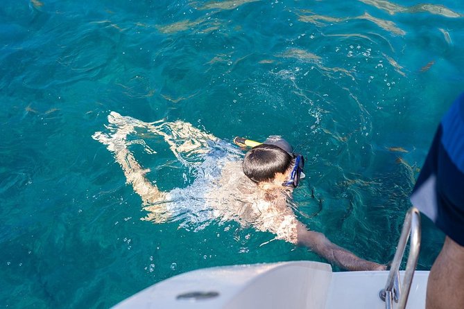 Santorini Adventurous Catamaran Experience with Snorkeling - Crew culture, safety briefings, and names you might hear onboard