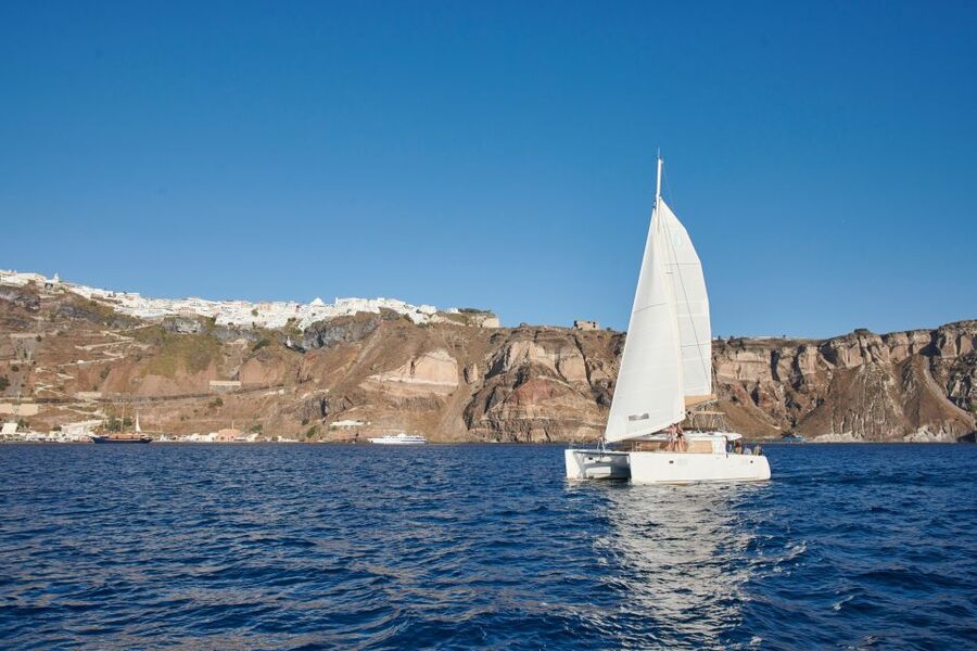 Santorini Gold Catamaran Cruise with Snorkel, BBQ & Open Bar - Mesa Pigadia Beach BBQ lunch: where the day feels like a party