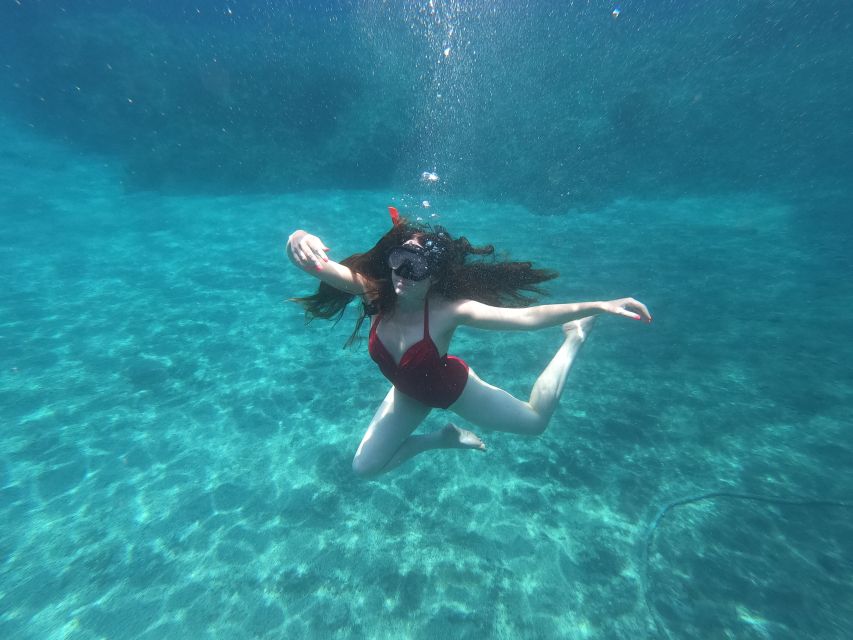 Santorini: Sea Caves Kayak Trip with Snorkeling and Picnic - Akrotiri Coastline: Sea Caves, Formations, and That Blue-Light Moment